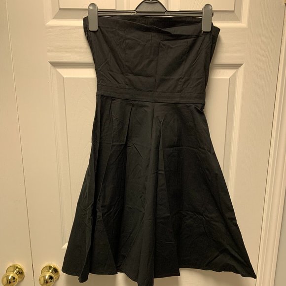 Black Dress with a Statement Flower - Picture 3 of 6